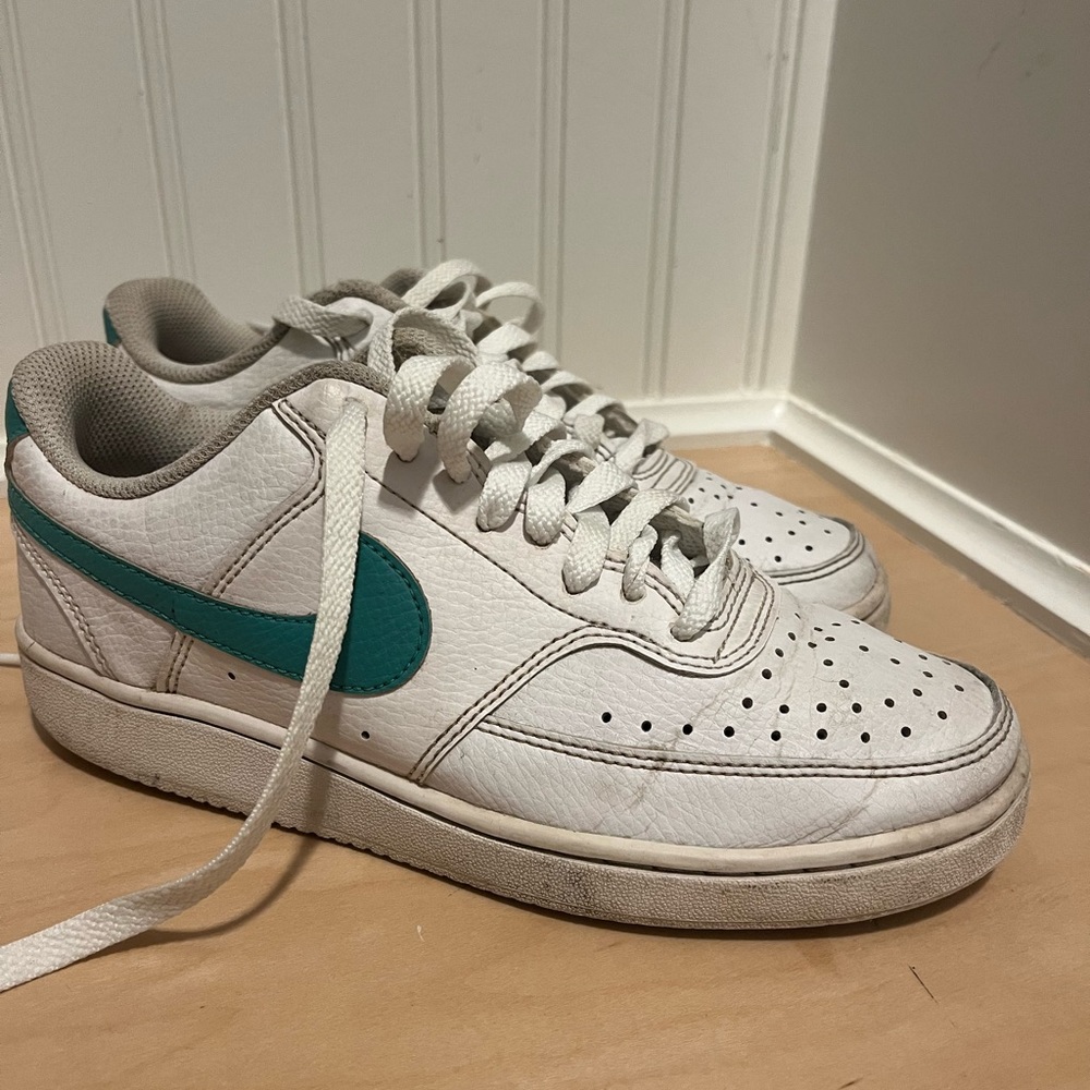 Nike court low. Youth size 6.5. Two pairs.